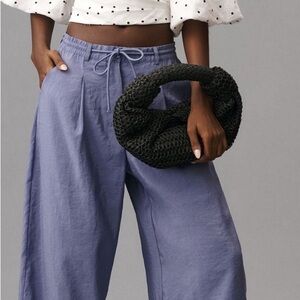 Maeve Lavender Wide-Leg Pants with Black Knit Bag